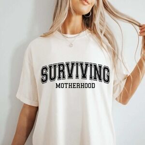 Surviving Motherhood NEW white short sleeve shirt